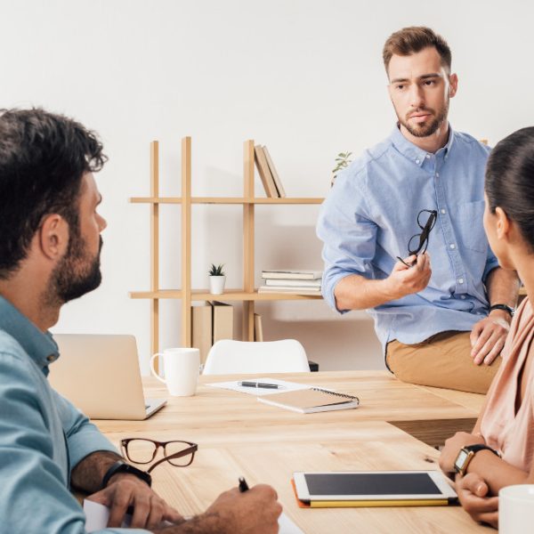 3 people having a discussion
