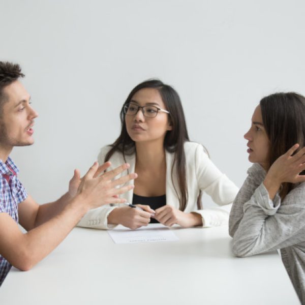 Couple discussing issues with mediator