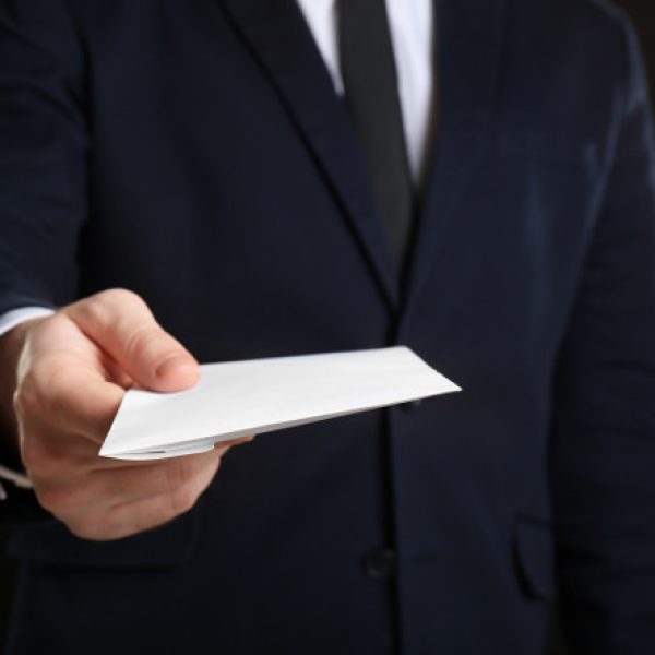 man holding envelope